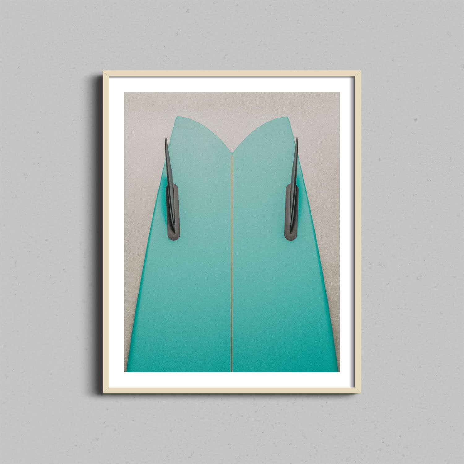 Fine art photography print featuring a green surfboard leaning against a cream textured wall framed with a natural wooden frame.