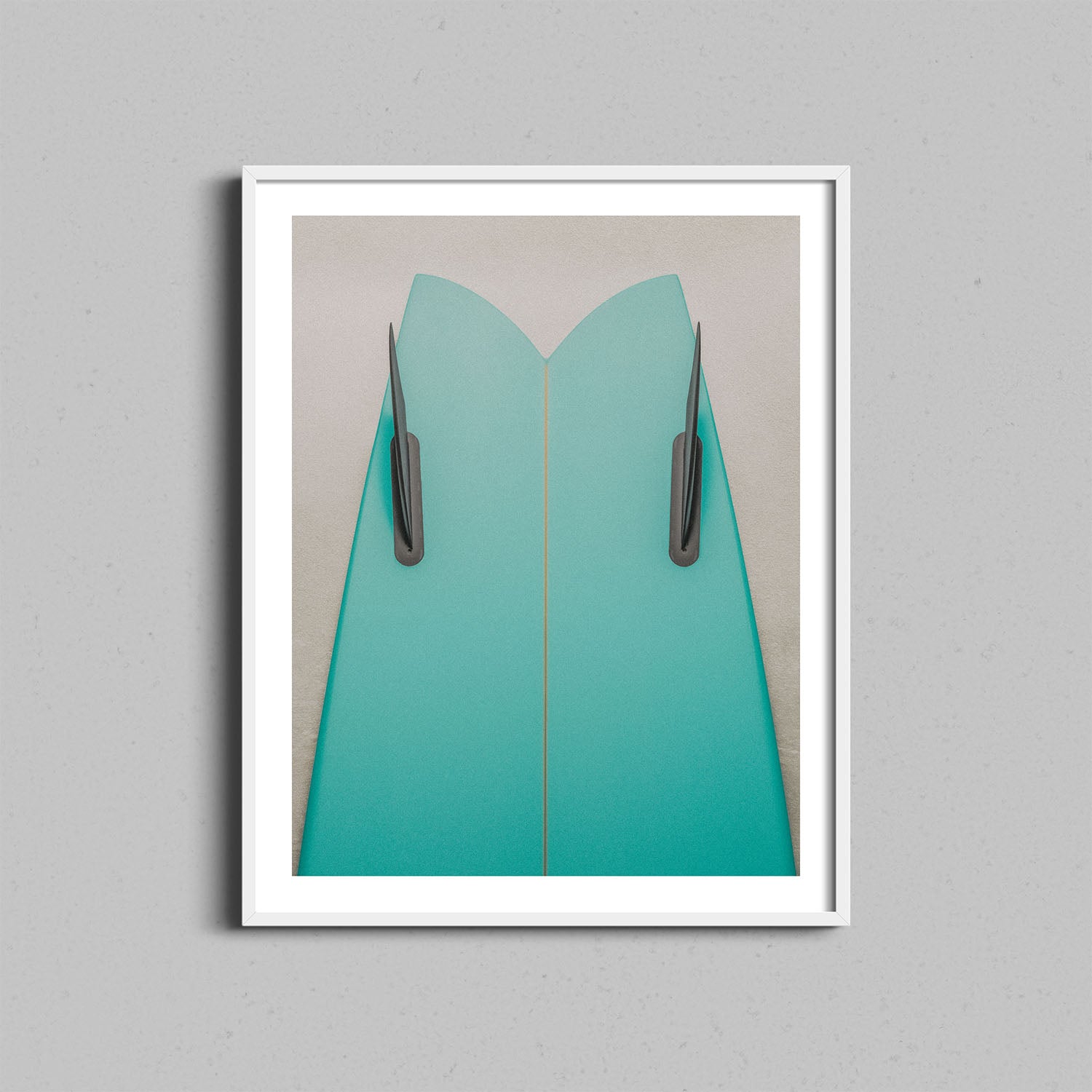 Fine art photography print featuring a green surfboard leaning against a cream textured wall framed with a white wooden frame.